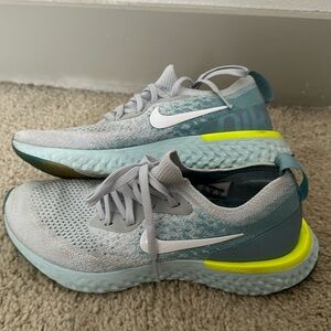 Light Blue Nike Fly Knit Sneakers